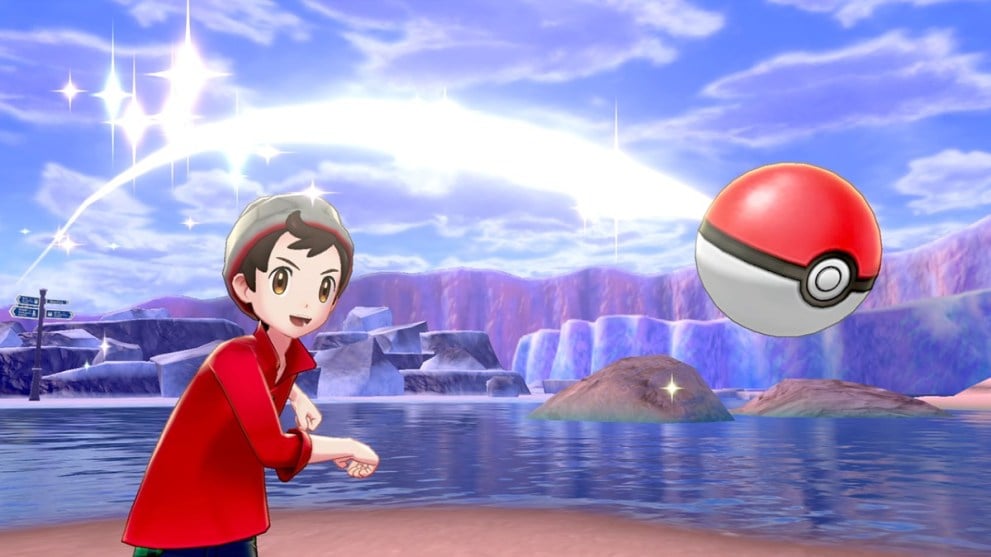 Pokemon Sword throwing a pokeball in a snowy region